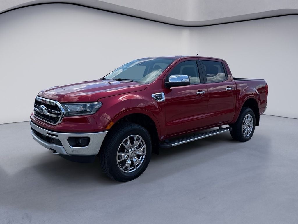 2021 Ford Ranger LARIAT in Rapid Red Metallic Tinted Clearcoat — front three-quarter view