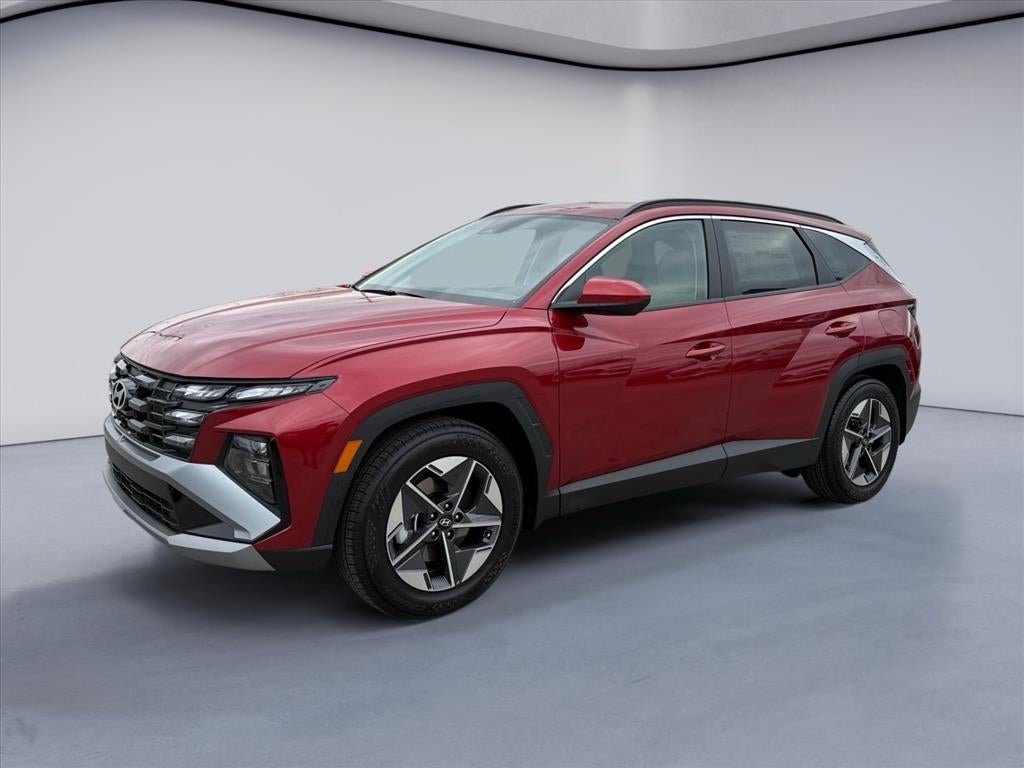 2026 Hyundai TUCSON SEL in Ultimate Red — front three-quarter view