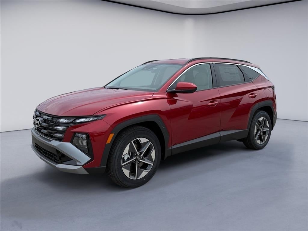 2026 Hyundai TUCSON SEL in Ultimate Red — front three-quarter view