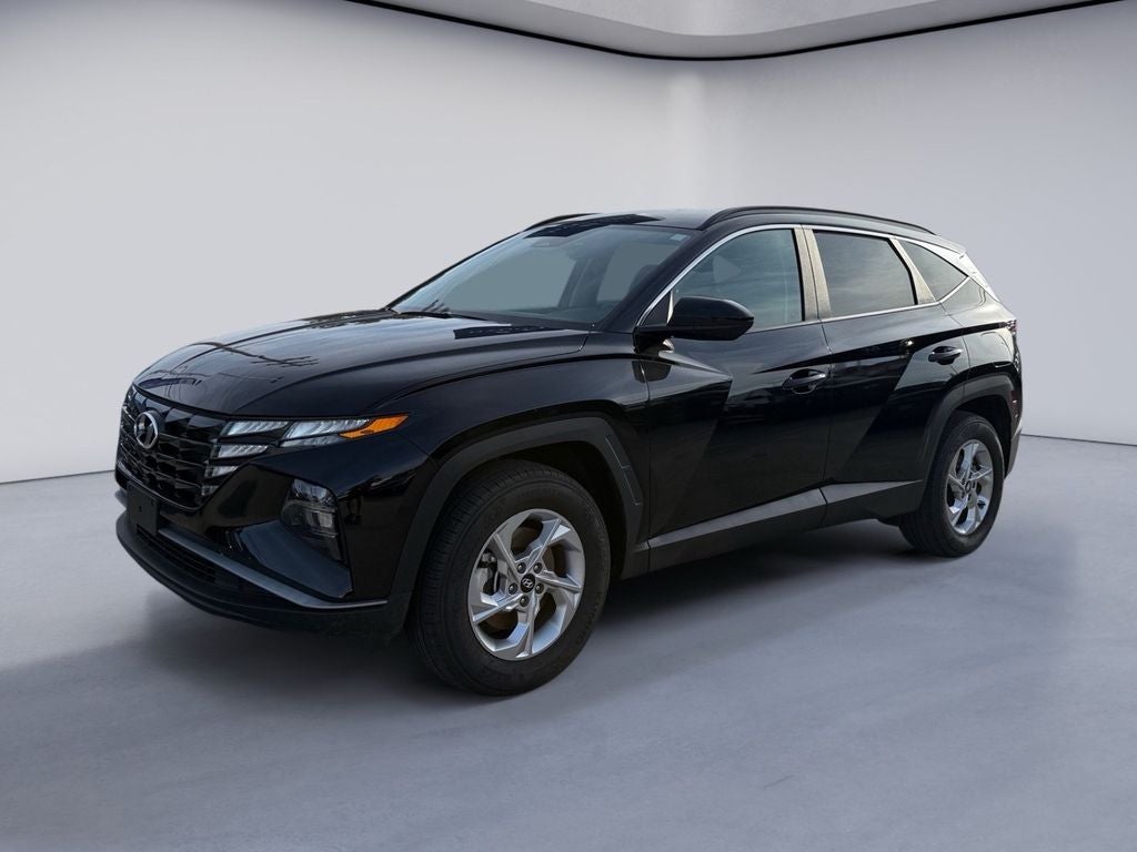 2024 Hyundai TUCSON SEL in Black Pearl — front three-quarter view