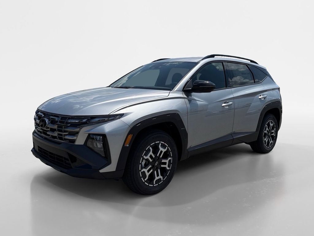 2026 Hyundai TUCSON XRT in Shimmering Silver — front three-quarter view