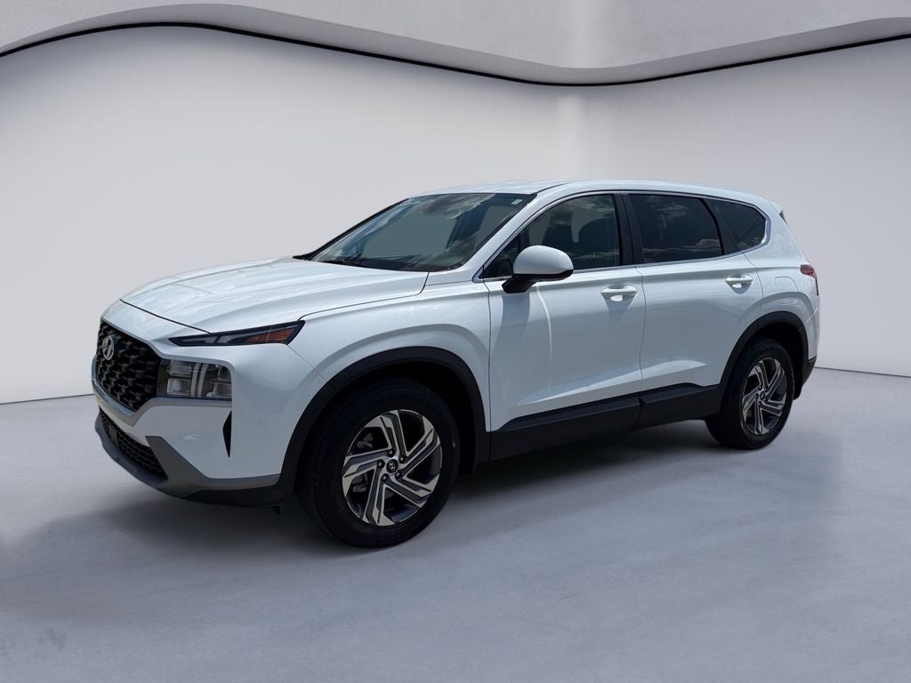2023 Hyundai SANTA FE SE in Serenity White Pearl — front three-quarter view