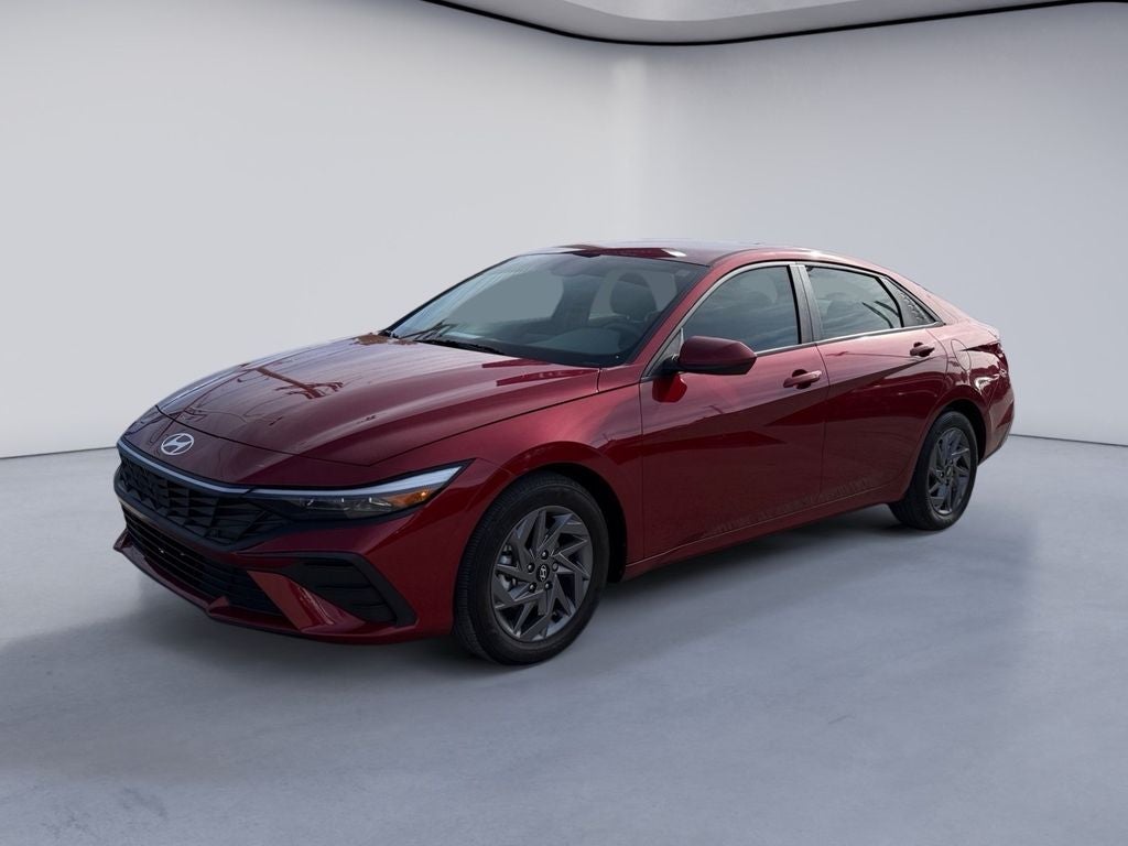 2024 Hyundai ELANTRA SEL in Ultimate Red — front three-quarter view